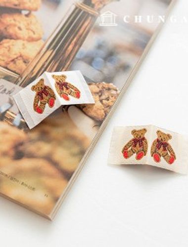 織嘜插入蝴蝶結熊形標籤插入