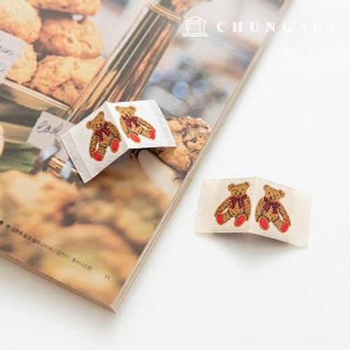 織嘜插入蝴蝶結熊形標籤插入