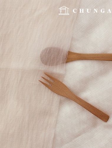 人造絲布料，飄逸平整的圖案，寬幅布料褶皺，蜜桃米色